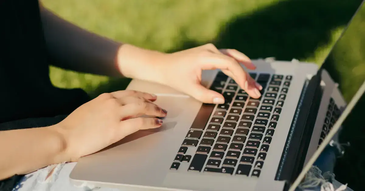 farmer on computer using shopify for farms